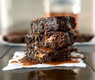 Peanut Butter Stuffed Brownies with Boozy Caramel Sauce - Brownie Bites ...