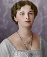 a painting of a woman wearing a tiara and pearls on her neck, in front ...