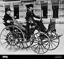 Gottlieb Daimler et son fils Adolf dans une Daimler motor carriage ...