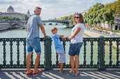 Happy Family of Three Enjoying Vacation in Paris, France Stock Photo ...
