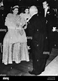 Queen Elizabeth II smiles as she is received by Prince Littler on ...