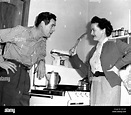 From left: Robert Ryan with wife Jessica at home, ca. 1950s Stock Photo ...