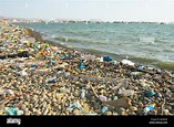 Polluted beach. Environmental contamination wit plastics in the coast ...