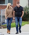 Anna Faris holds hands with beau Michael Barrett on morning stroll as ...