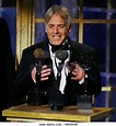 Lenny Davidson, a member of The Dave Clark Five, accepts his award ...