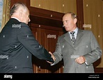 Presidents Mukhu Aliyev of Dagestan and Vladimir Putin of Russia left ...