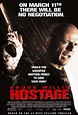 A hostage negotiator must free a family in a hour and his own family ...