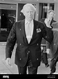 Sir Michael Havers leaving London's Heathrow Airport in May 1987 Stock ...