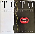 Toto - Stranger In Town - : Toto: Amazon.es: CD y vinilos}
