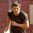 Breaking Dawn Bonus Pic! Taylor Lautner Runs in the Rain! - E! Online