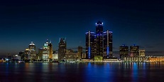 Detroit, Michigan skyline at night shot from Windsor, Ontario ...