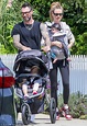 Adam Levine plays the doting dad as he pushes stroller during family ...