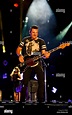 Jay DeMarcus bassist of Rascal Flatts on stage Stock Photo - Alamy