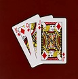 Premium Photo | Playing cards king queen jack deck with red background ...