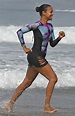 Zoe Saldana keeps cool by splashing around in Malibu surf while ...