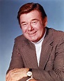 Portrait of Arthur Godfrey Posed in Coat with Blue Background Photo ...