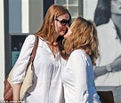 Saffron Burrows engages in a very public display of affection with new ...