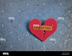 Broken red cheating heart Stock Photo - Alamy