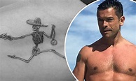 Mark Consuelos shows off a new bicep tattoo of a skeleton wearing a ...