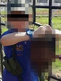 Boy holding severed head - ABC News (Australian Broadcasting Corporation)