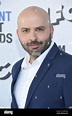 Enrico Natale arrives at the 2022 Film Independent Spirit Awards held ...