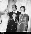 John Russell (rear) with wife Renata Titus (right) and son John James ...