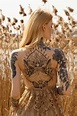 30 Glamorous Back Tattoo Ideas For Women