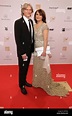 German actress Barbara Auer and partner Martin Langer arrive at the ...