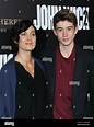 Carrie-Anne Moss and Owen Roy attending the premiere of John Wick ...
