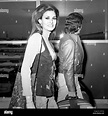 Raquel Welch arrives at Heathrow airport with husband Patrick Curtis ...