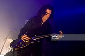 Photo of Aaron NORTH and NINE INCH NAILS; Aaron North performing at ...