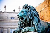 Lion on the Equestrian statue of Philips IV at Palacio Real de Madrid ...