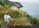 Back View Young Woman Sitting Cliff Looking Ocean — Stock Photo ...