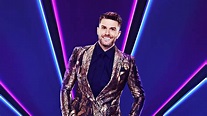 The Masked Singer presenter Joel Dommett explains why we all need the show