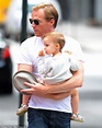Paul Bettany enjoys a day of fun in the sun at the park with excitable ...