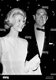 DORIS DAY and MARTIN MELCHER attend the 1960 Academy Awards at the ...