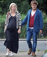 Mark Owen takes a stroll with heavily-pregnant wife Emma Ferguson ...
