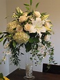 Tall white centerpiece arrangement in Trumpet vase of Casablanca ...