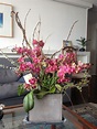Orchid arrangement with spirea | Orchid arrangements, Floral ...