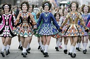 Fast feet, curly wigs, and straight arms: Learn more about Irish dance ...