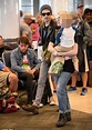 Rachel Wood cradles her son as she jets out of LAX | Daily Mail Online