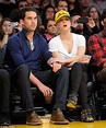Kaley Cuoco proudly displays wedding and engagement rings at Lakers ...