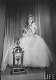 Miss America 1957, Marian McKnight, wearing formal evening dress and ...
