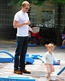 Paul Bettany enjoys a day of fun in the sun at the park with excitable ...