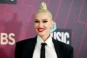 Gwen Stefani Suits Up in Miniskirt & Fur Boots at CMT Awards 2023 – WWD
