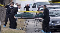 Police remove a body from the scene of a multiple fatal stabbing in ...