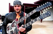Pictures of Robert Rodriguez with Guitars - The Robert Rodriguez Archives