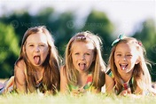 Three little girls sticking their tongues out 9367112 Stock Photo at ...
