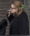 Carrie Fisher lights up a cigarette outside London studio following ...