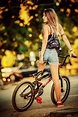 Lovely young woman riding a BMX bicycle - 54ka [photo blog]